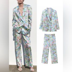 New floral suit. Never worn. Fits size medium. 35 or best offer.